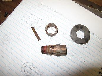  Here's the valve with the shroud pushed off. I just happened to have a steel washer with the same size 11/16